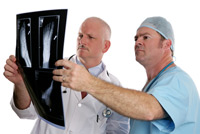 doctors looking over xray